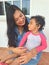 Latina mom and daughter show their love by living with autism spectrum disorder, a developmental disability caused by differences