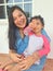 Latina mom and daughter show their love by living with autism spectrum disorder, a developmental disability caused by differences