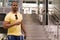 Latino american man walking with baggage at subway near stairs