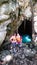 Latino man and woman couple visit the pier of the Tamul Waterfall, Cueva del Agua in Tamasopo San Luis Potosi Mexico on their vaca