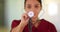 Latino nurse holding up stethoscope