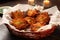 latkes in a basket lined with a napkin