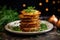 latkes stacked high on a ceramic dish with a parsley garnish