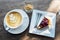 Latte coffee and blueberry cheesecake