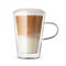 Latte coffee in a transparent glass cup isolated