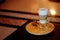 Latte macchiato coffee Served with cookie in brown earth tone color background