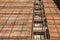 Lattice joist for reinforced concrete floor slab and clay block