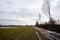 Latvia rural landscape in spring when the snow has melted and the meadows