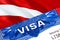 Latvia Visa in passport. USA immigration Visa for Latvia citizens focusing on word VISA. Travel Latvia visa in national