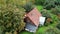 Latvian house amidst abundant green vegetation on the outskirts of Riga in September 2019