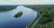 Latvian rural landscape with a winding river, forests and country roads, aerial top view. Daugava river