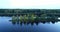 Latvian rural landscape with a winding river, forests and country roads, aerial top view. Daugava river