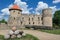 Latvian tourist landmark attraction - ruins of the medieval castle, stone walls and towers in Cesis town, Latvia