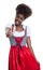 Laughing african american woman with bavarian oktoberfest showing thumb