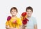 Laughing boy with bouquet gerbera flowers