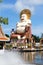 Laughing Buddha at Wat Plai Leam Temple in Koh Samui, Thailand