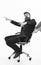 Laughing businessman sitting on the office chair and rolling