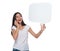 Laughing casual woman with telephone looks at speech bubble