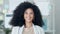 Laughing, confident and happy businesswoman with Afro in office. Young, attractive and professional worker finding a