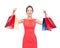 Laughing elegant woman in dress with shopping bags