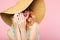 Laughing frolic woman sunhat summer fashion beauty