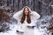 Laughing Girl Outdoors. Christmas girl outdoor portrait. Young woman winter portrait. Snowing winter beauty fashion