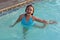 Laughing girl in swimming pool