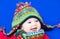 Laughing happy baby wearing a funny knitted hat an