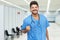 Laughing hispanic male doctor is ready for vacinating patients