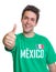 Laughing mexican sports fan showing thumb up