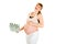Laughing pregnant woman holding gift for her baby
