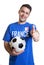 Laughing soccer fan from France with ball showing thumb up