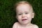 Laughing Toddler in Grass