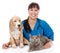 Laughing veterinarian hugging cat and dog. isolated