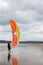 Launching a kite on Aberavon Beach, Wales