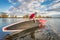 Launching stand up paddleboard on lake
