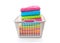 Laundry basket filled with colorful folded towels