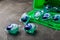 Laundry capsules on a black marble background.