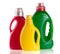 Laundry detergent bottle with fabric softener on white background
