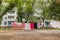 Laundry dries on the rope in courtyard of Khrushchyovka. Khrushchyovka is common type of old low-cost apartment building in Russia