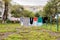 Laundry dries on the rope in courtyard of Khrushchyovka. Khrushchyovka is common type of old low-cost apartment building in Russia