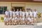 Laundry staff in uniform gathered for group photo