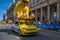 Lausanne, Vaud Canton, Switzerland -09.07.2022: Passage of an advertising car of yellow jersey LCL in the caravan of the Tour de