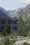 Lauvitel lake and pine tree under the slopes