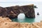 lava arch on Dyrholaey peninsula in Iceland