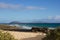 Lava fields. Black minerals. Coastal zone between land and water at the Fuerteventura and Atlantic ocean. Spain, Europe.