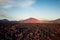 lava fields in Lanzarote with volcano mount view