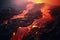 Lava flow emerging from a rock and pouring into a black volcanic landscape. Natural disasters