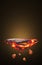 Lava rocks, hot magma, burning coals or meteor planet floating on black and dark background. Product display stand advertisement.