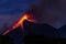 Lava spurts from erupting Fuego volcano in Guatemala